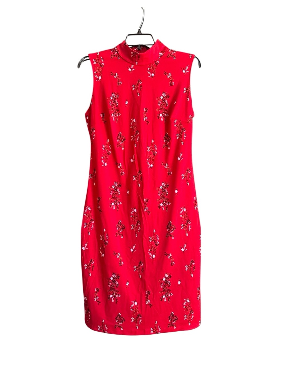 Sleeveless floral print midi dress with a mock neck. Size Medium
